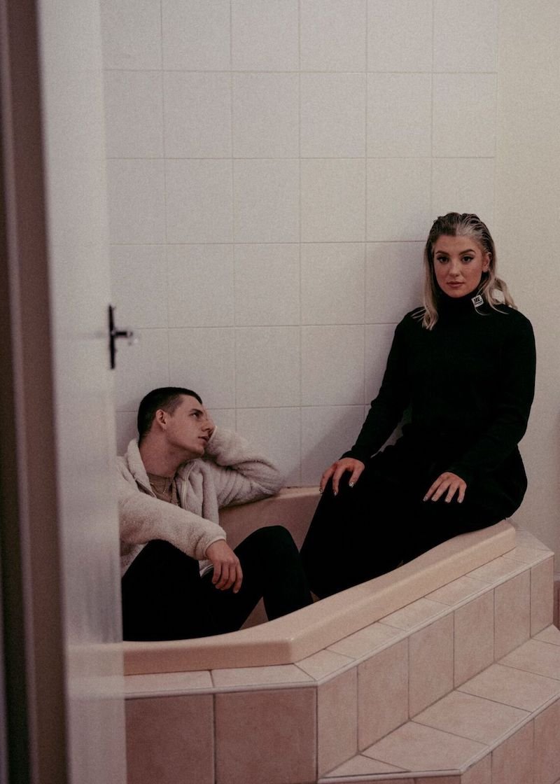 Evangeline + LOVER press photo in a bathtub