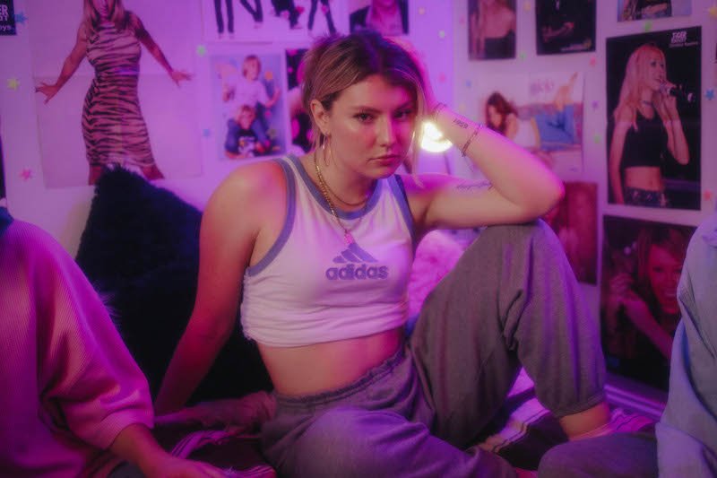 Dasha - “More Than This” video press photo in a bedroom