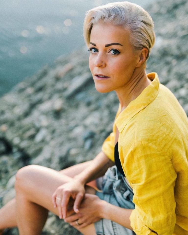 Kristina Nichol press photo wearing a yellow shirt
