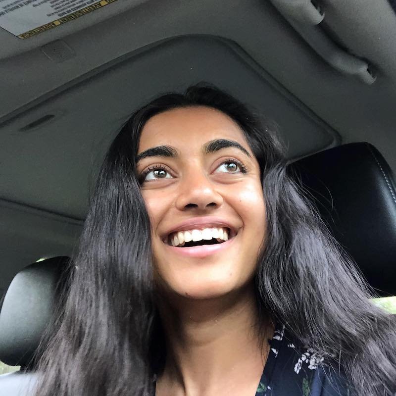 EASHA press photo inside of a car laughing 