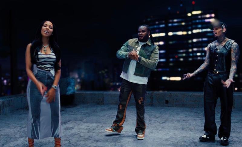 Tee Grizzley - “IDGAF” video photo featuring Mariah the Scientist and Chris Brown